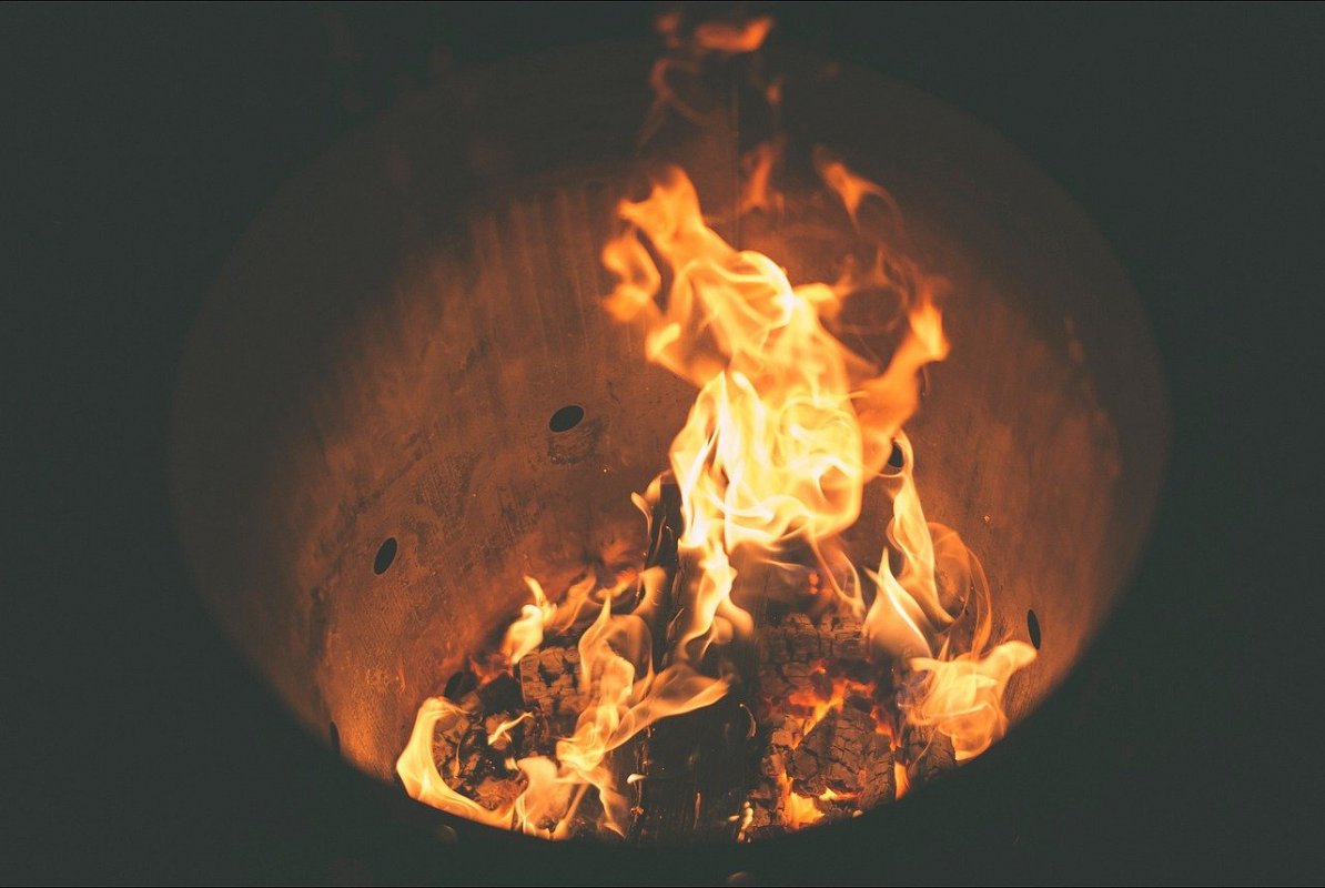 Fire pit burning logs