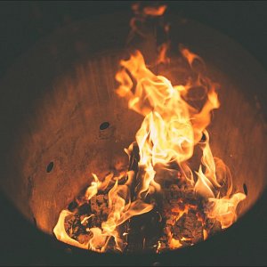 Fire pit burning logs